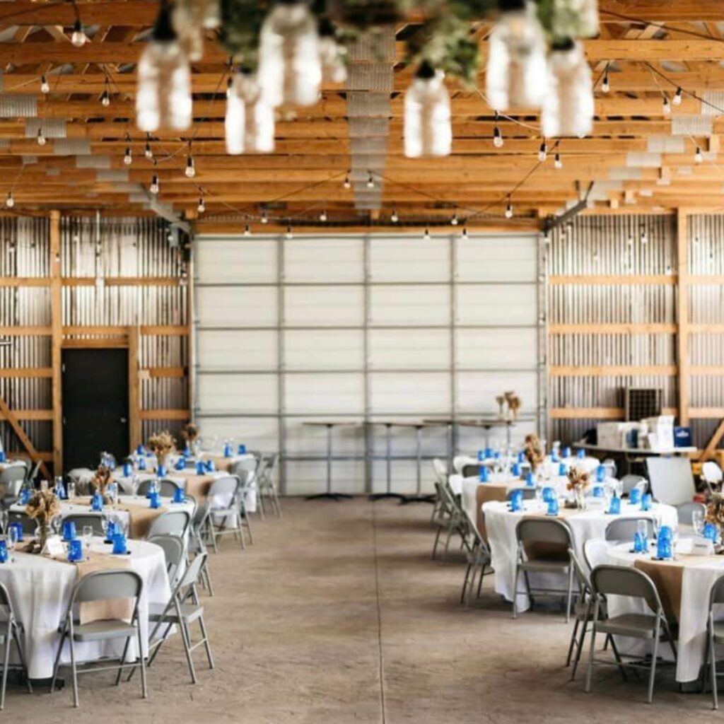table setup for wedding reception at barn venue